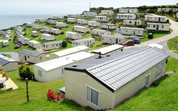 row of static caravans at a holiday park