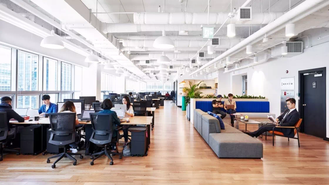 A busy office with lots of computers